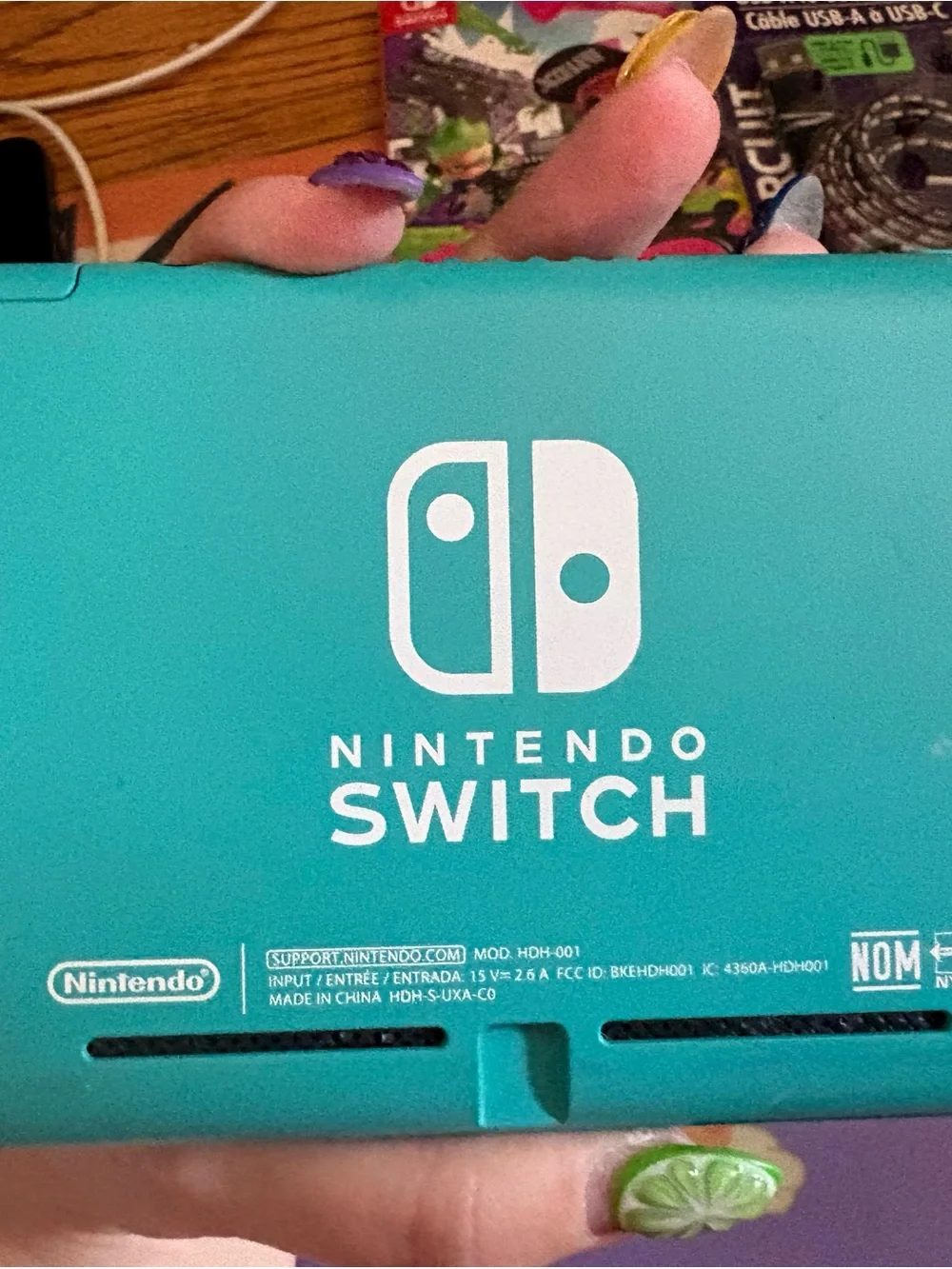 Nintendo Switch Lite Turquoise Handheld Console with Splatoon 2 and Accessories
